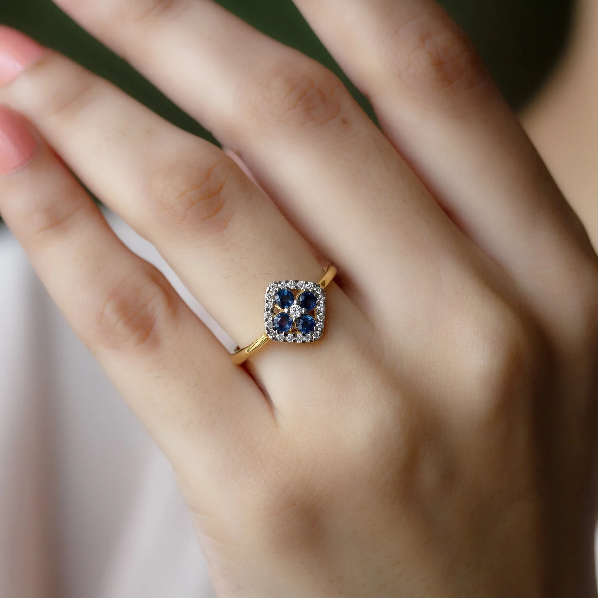 1/2 CT Blue Sapphire Cluster Ring with Diamond Accent