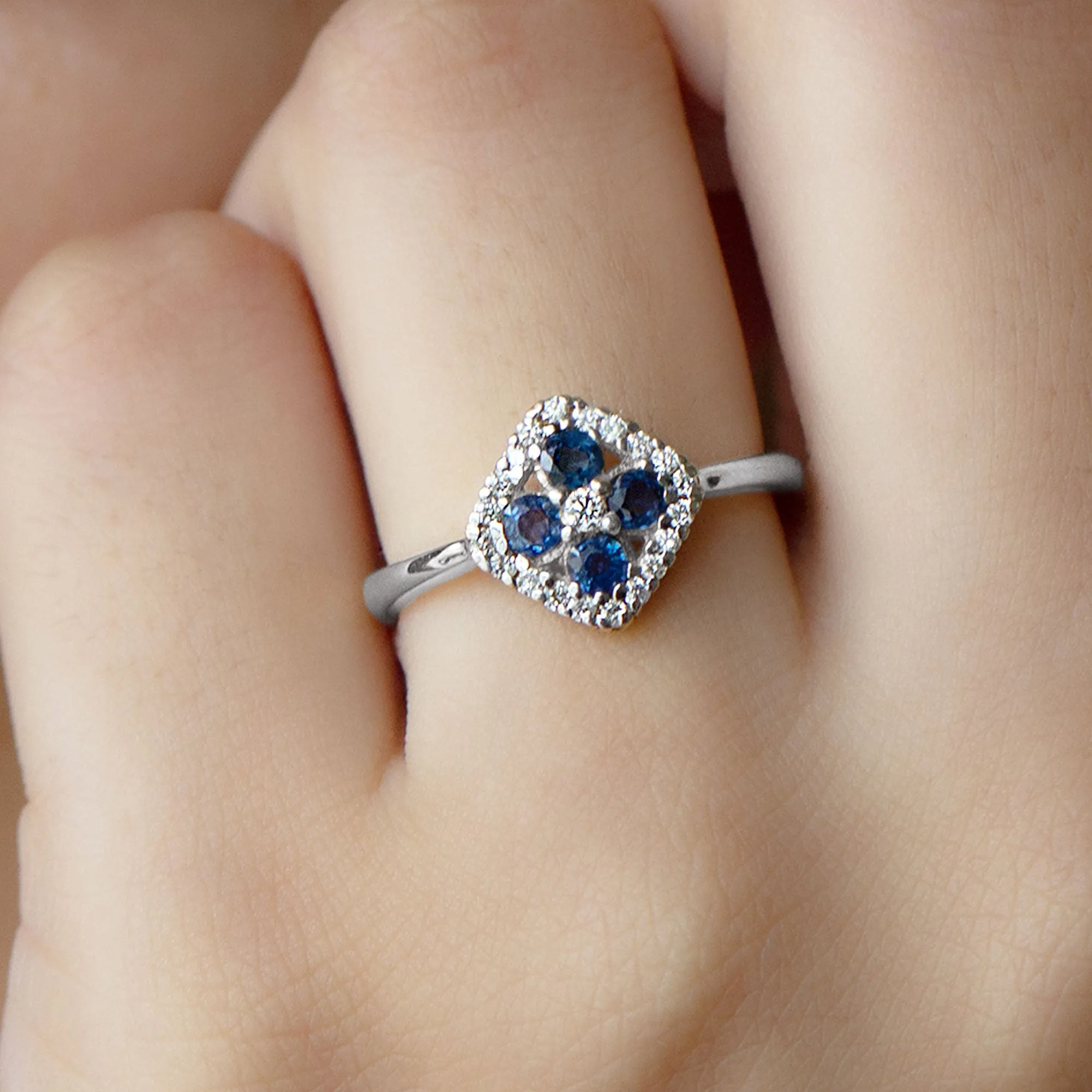 1/2 CT Blue Sapphire Cluster Ring with Diamond Accent