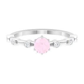 6 Prong Set Solitaire Rose Quartz Ring with Spaced Diamond