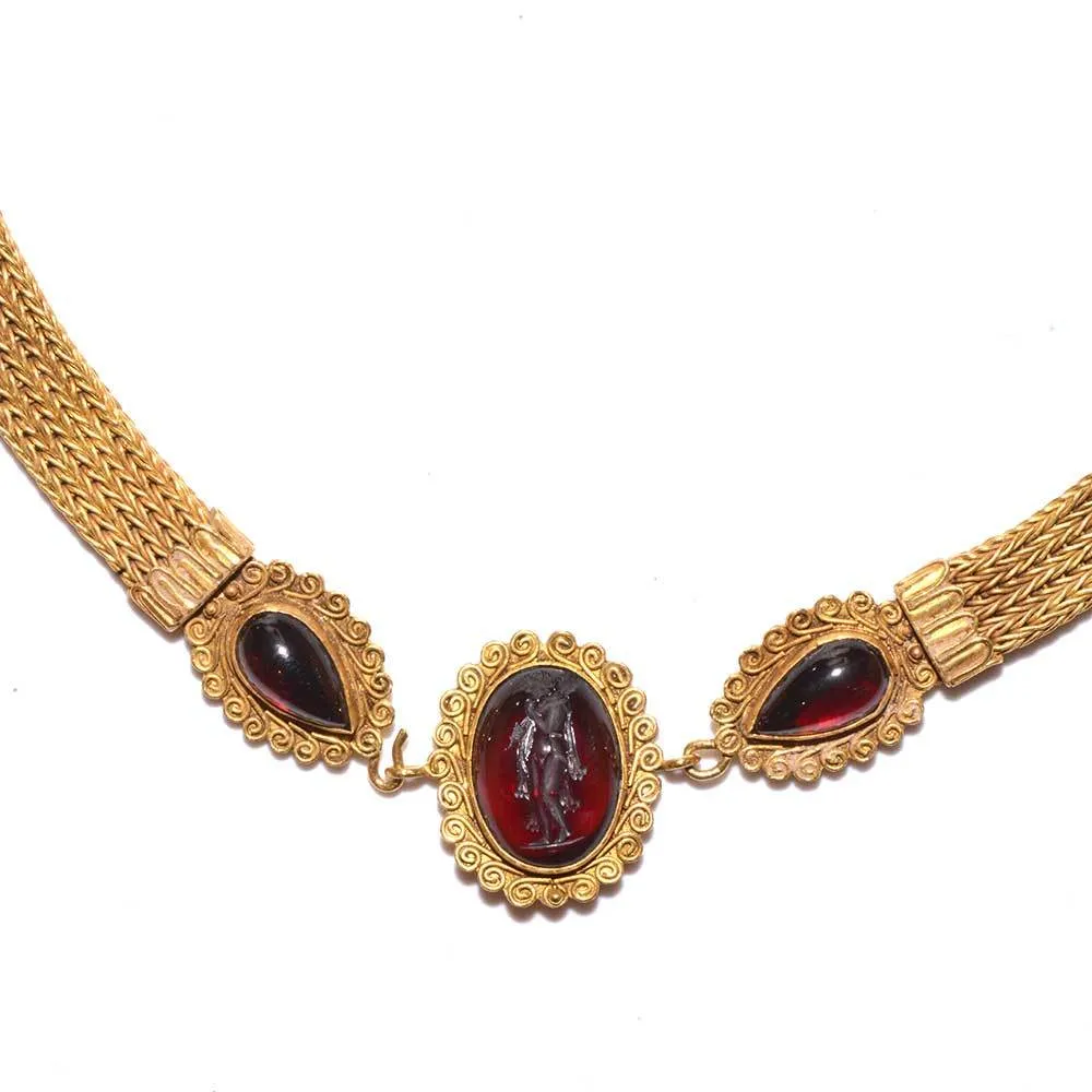 A Greek Revival 18K Gold and Garnet Intaglio Necklace, 19th century, after the antique.