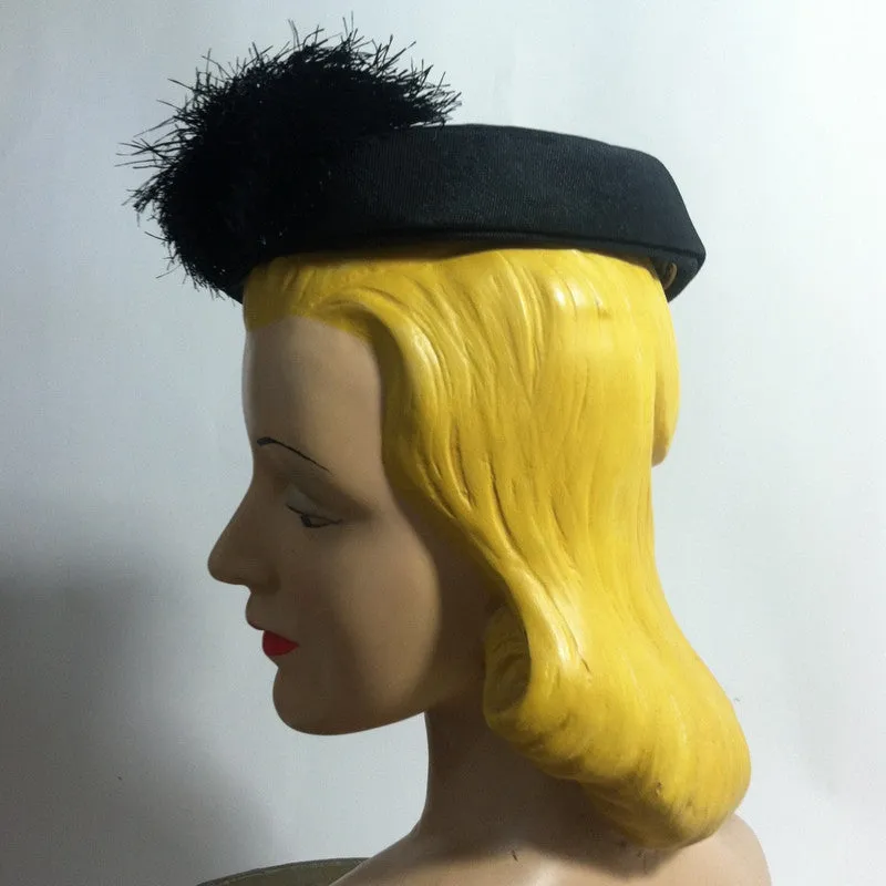 Black Whirled Mini Pillbox Hat with Fringed Accent circa 1960s Nina Neal