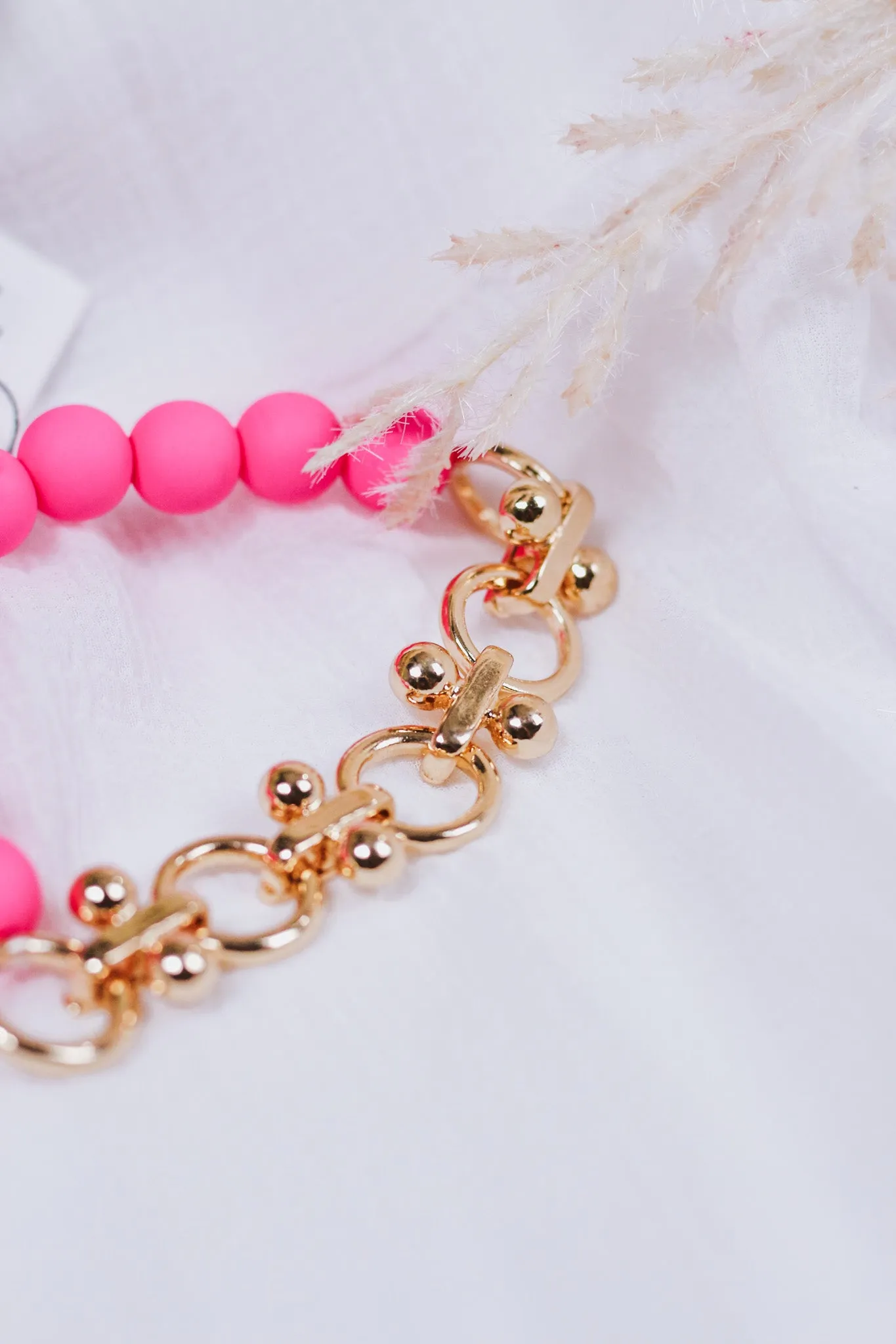 Hot Pink Color Coated Bead with Gold Chain Stretch Bracelet