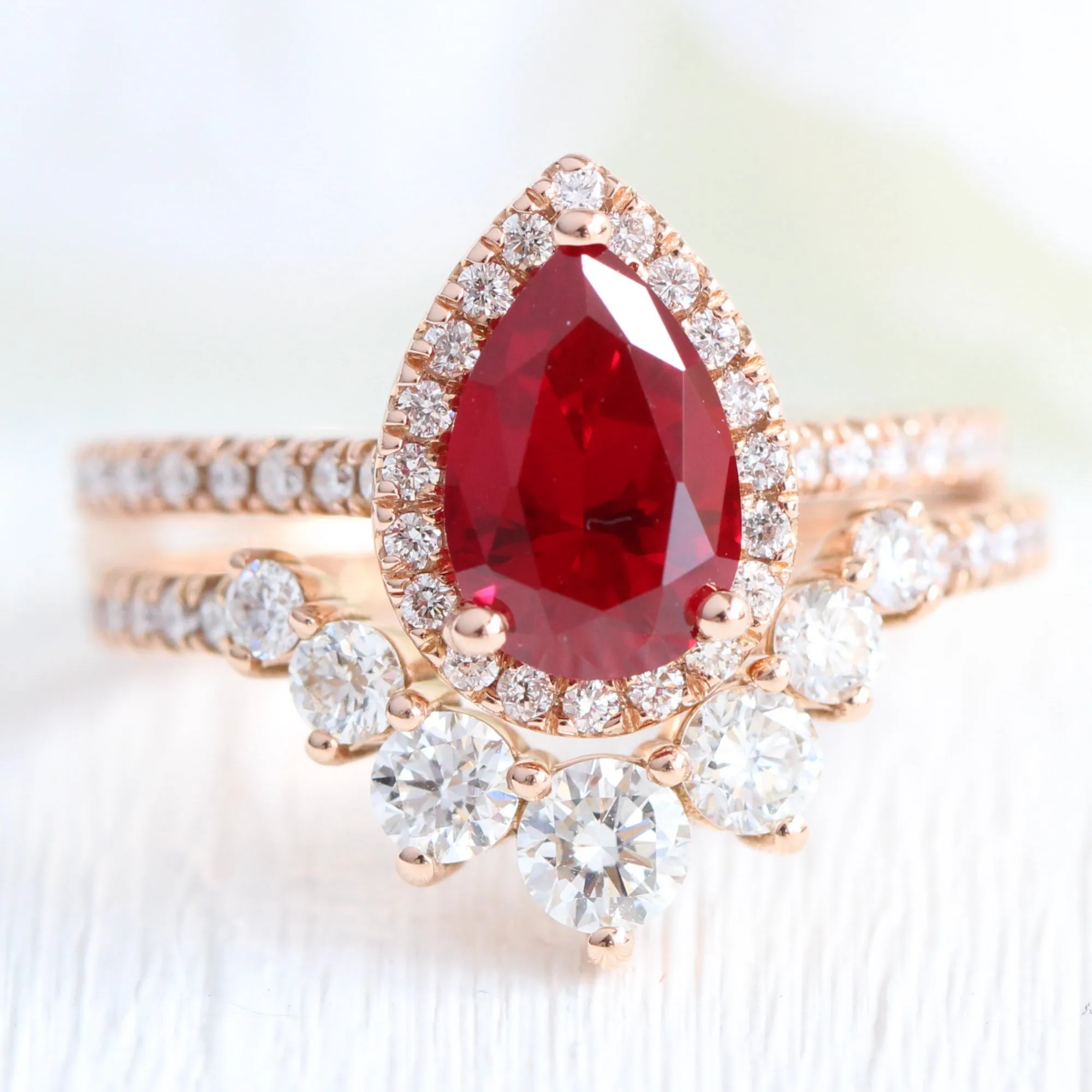 Pear Ruby Engagement Ring in Luna Halo Diamond Pave Band