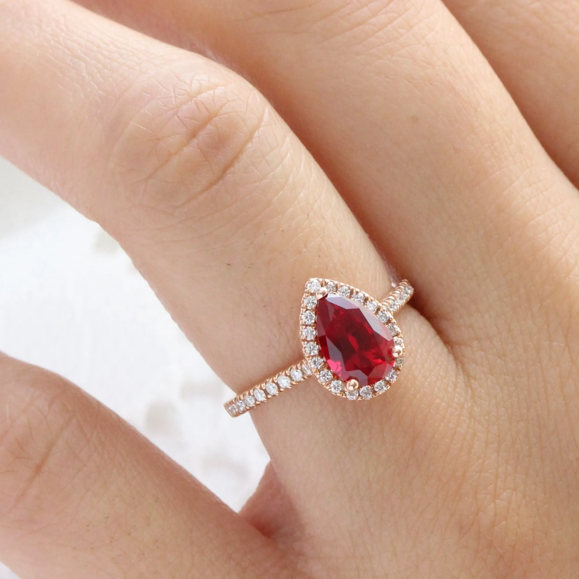 Pear Ruby Engagement Ring in Luna Halo Diamond Pave Band