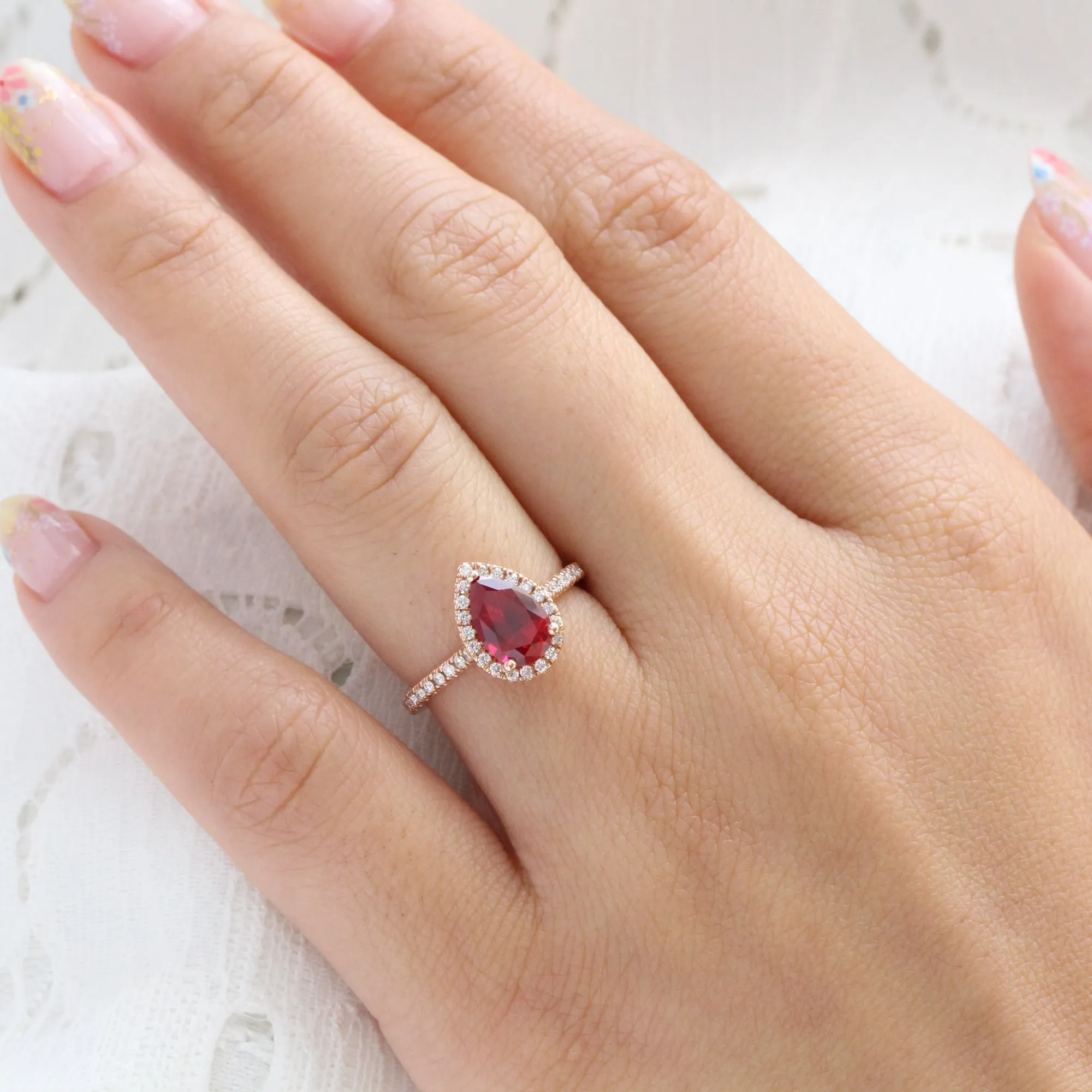 Pear Ruby Engagement Ring in Luna Halo Diamond Pave Band