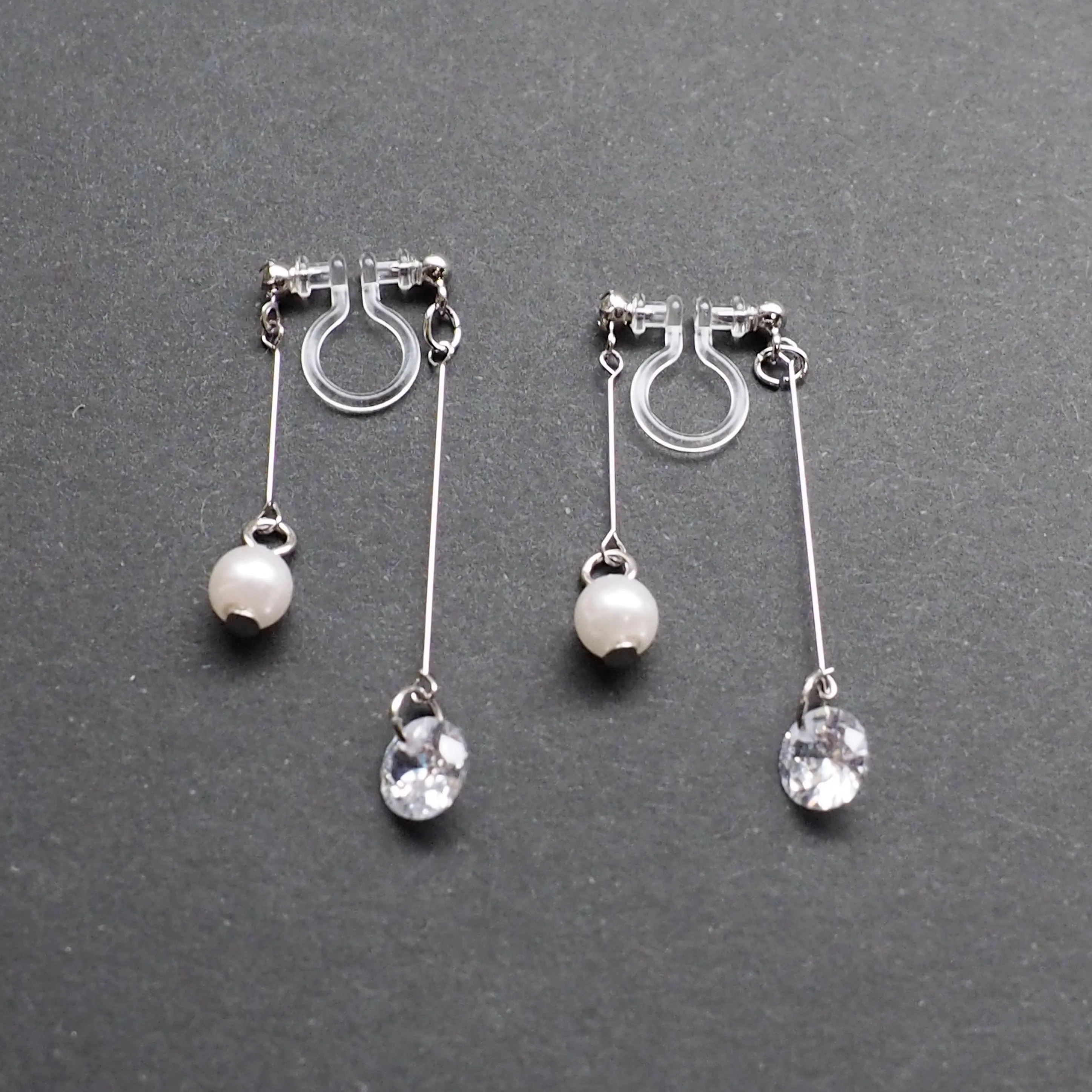 Silver double sided pearl & cubic zirconia crystal dangle invisible clip on earrings