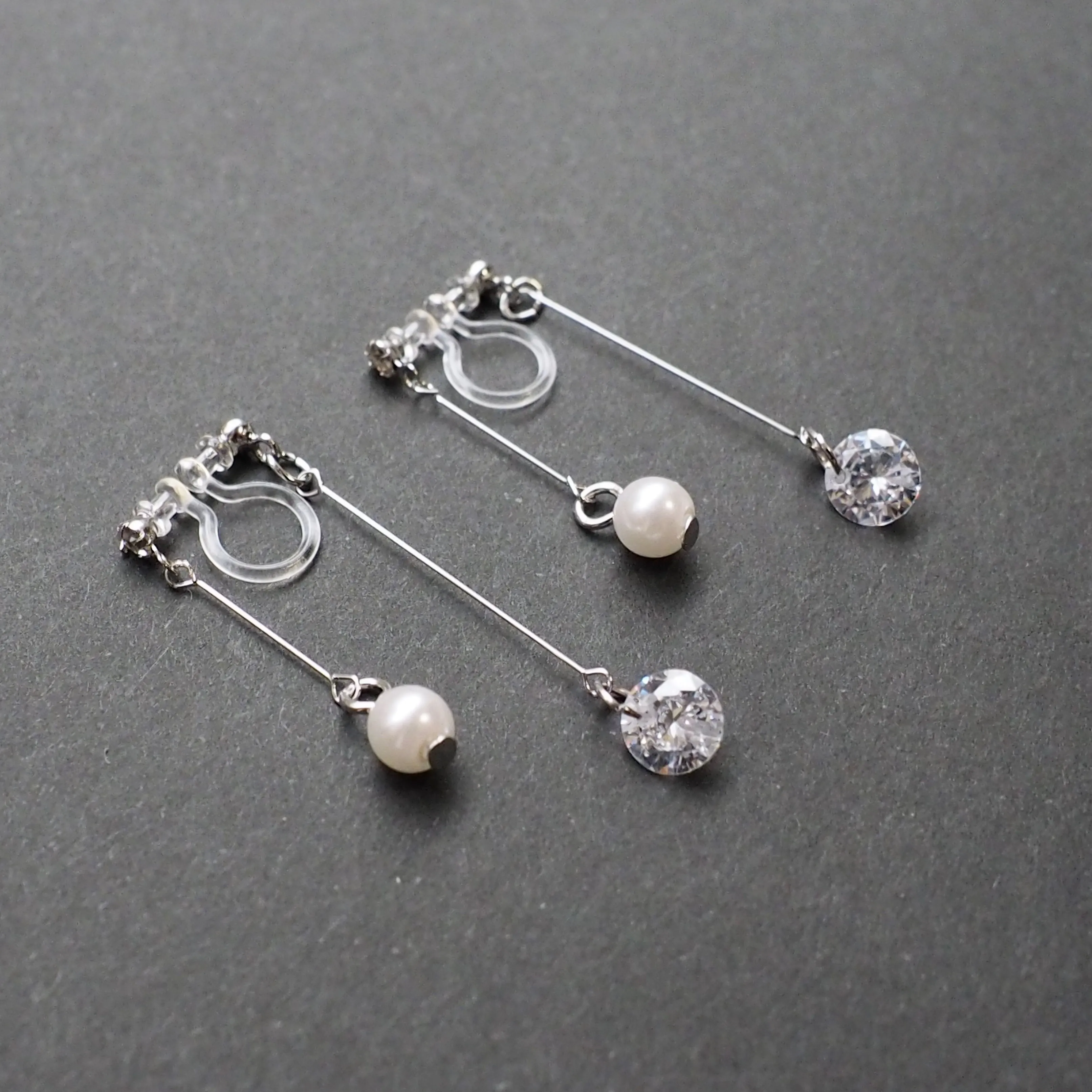 Silver double sided pearl & cubic zirconia crystal dangle invisible clip on earrings